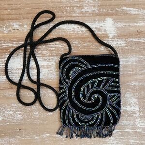 Black and Blue Crossbody Bag with Intricate Design and Fringe